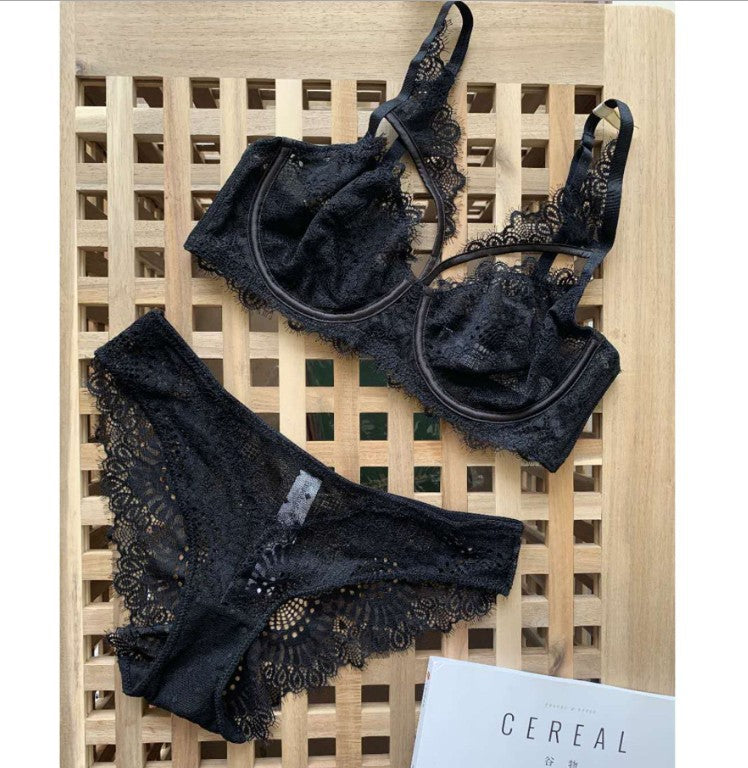 Conjunto de sujetador hueco con bordado de encaje sexy de lencería ultrafina