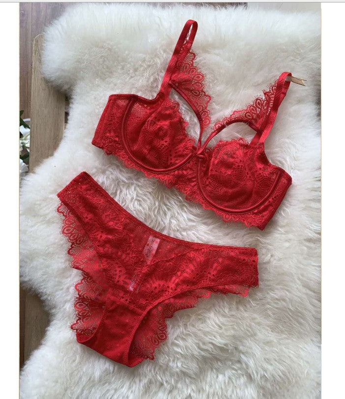 Conjunto de sujetador hueco con bordado de encaje sexy de lencería ultrafina