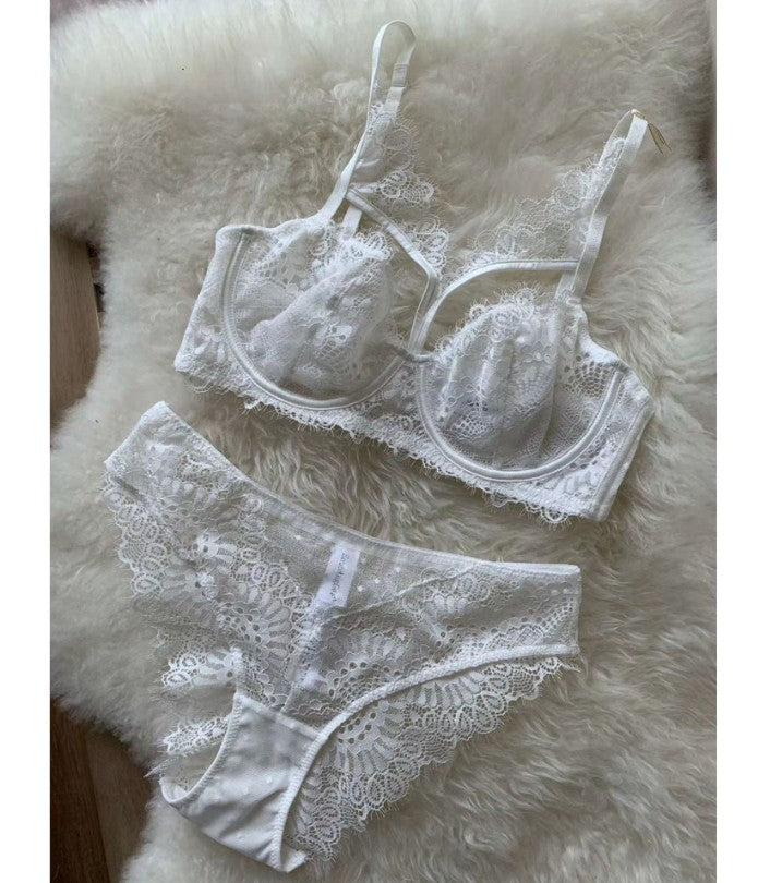 Conjunto de sujetador hueco con bordado de encaje sexy de lencería ultrafina