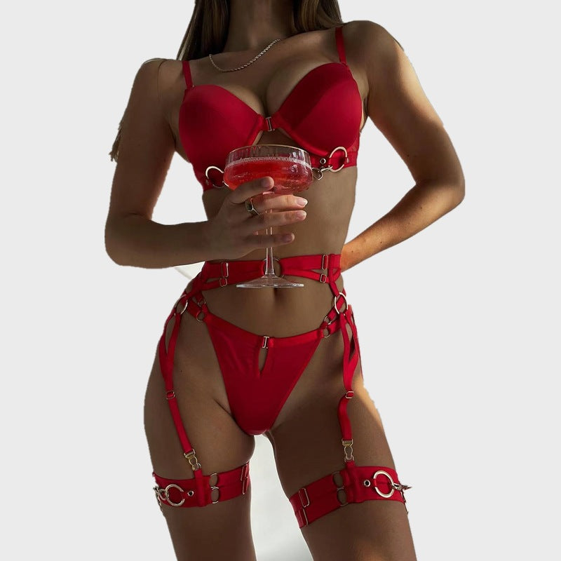 Conjunto de lencería sexy con hebilla delantera de cuatro piezas de color sólido con cadena de metal