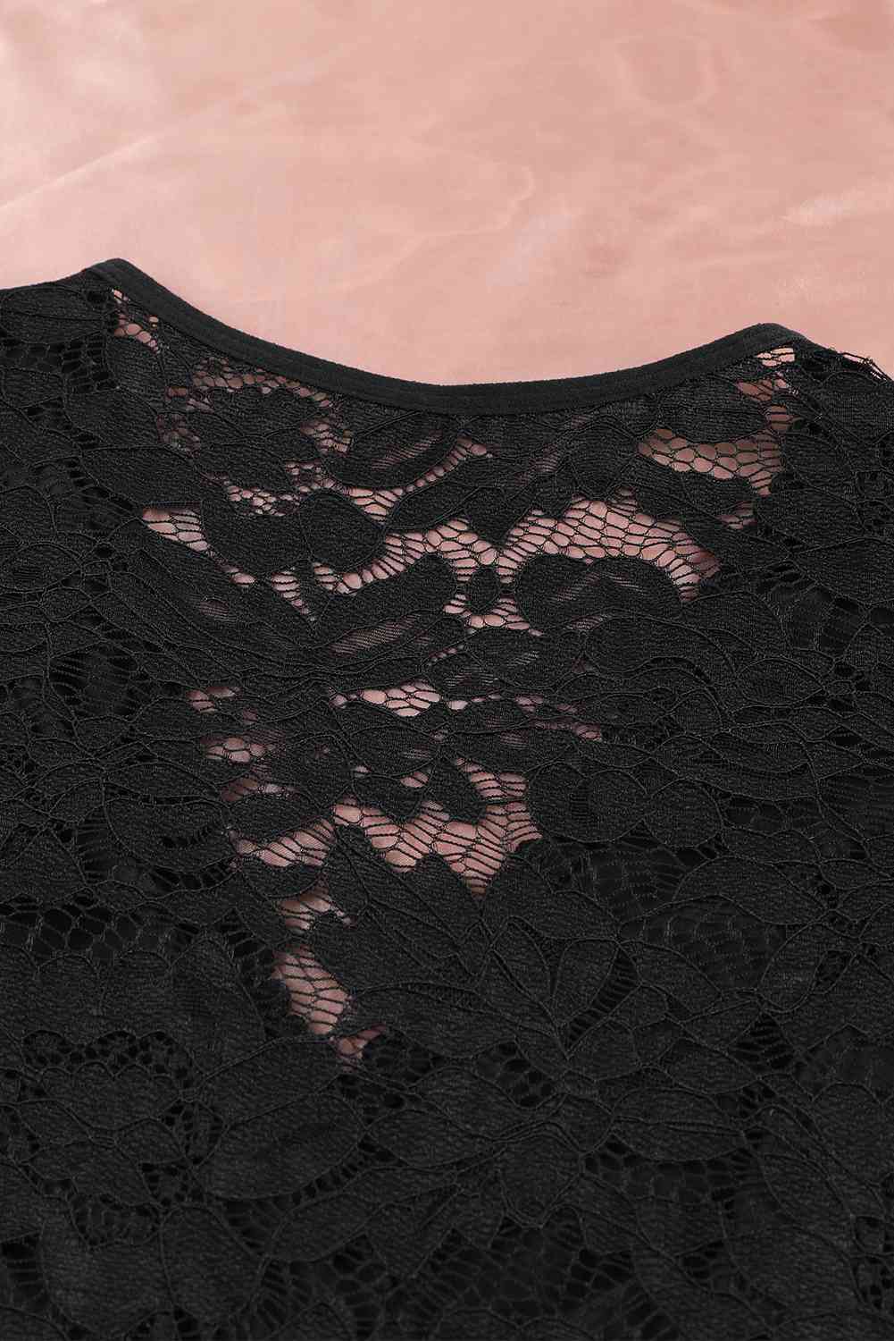 Body en dentelle à manches longues bouffantes et col surplis