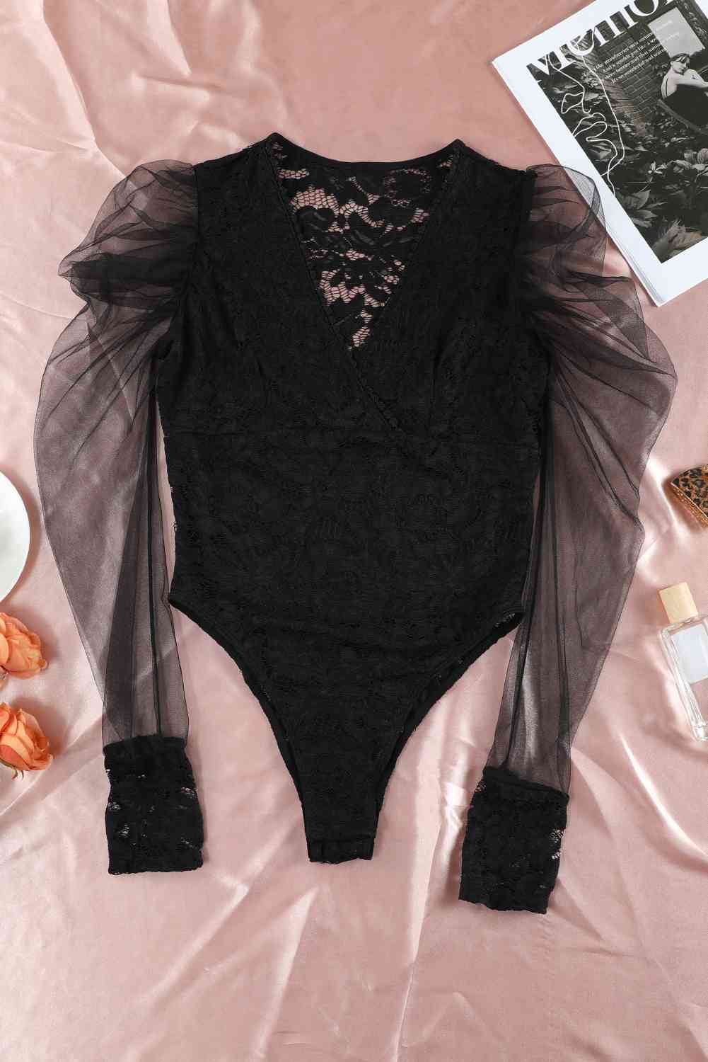 Body en dentelle à manches longues bouffantes et col surplis